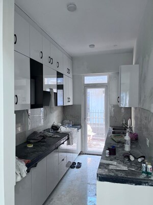 Kitchen in 2.5 BHK Apartment at Smart World Gems, Sector 89 – for Rent