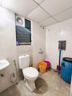 Bathroom in 2 BHK Apartment at Kolte Patil Margosa Heights, Mohammadwadi – for Rent