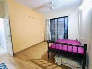 Bedroom in 2 BHK Apartment at Kolte Patil Margosa Heights, Mohammadwadi – for Rent