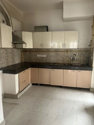 Kitchen in 3 BHK Apartment at Nimbus The Golden Palm, Sector 168 – for Rent