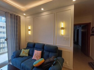 Living Room in 2.5 BHK Apartment at Bhartiya Nikoo Homes, Thanisandra Main Road – for Sale