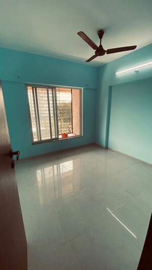 Room in 2 BHK Apartment at Mahalunge – for Rent