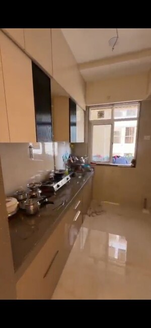 Kitchen in 2 BHK Apartment at Adarsh Nagar Society, Worli – for Rent