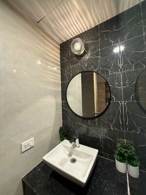Bathroom in Studio Apartment at Gaur City Mall, Sector 4 Greater Noida – for Rent