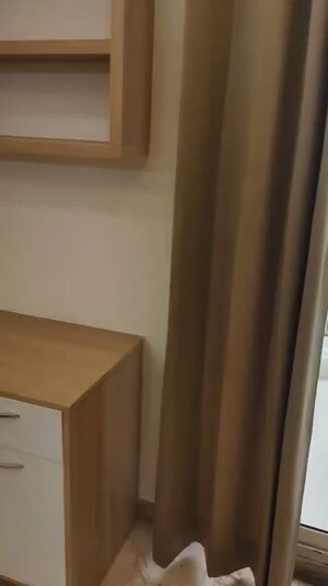Bedroom in 1 BHK Apartment at Nimbus The Golden Palm, Sector 168 – for Rent