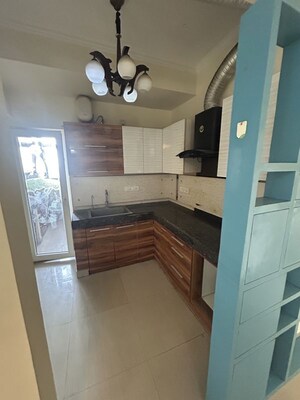 Kitchen in 2 BHK Apartment at Paramount Floraville, Sector 137 – for Sale