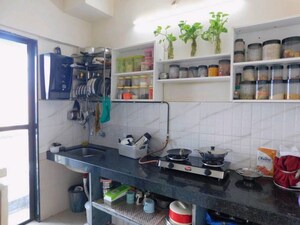 Kitchen in 1.5 BHK Apartment at Man Opus, Mira Road – for Sale