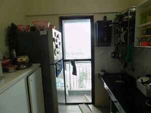 Kitchen in 1.5 BHK Apartment at Man Opus, Mira Road – for Sale