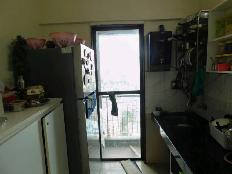 Kitchen, man-opus 1.5 Bedroom 535 Sq.Ft. Apartment In Mira Road Thane 10785042