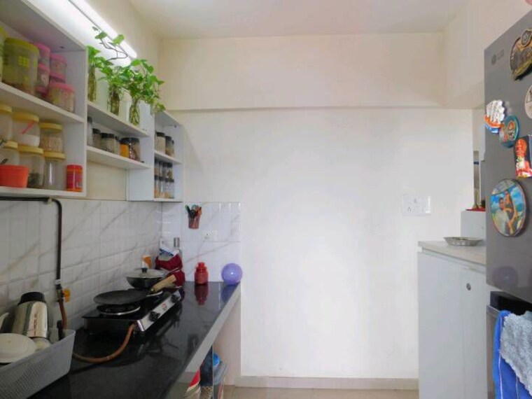 Kitchen, man-opus 1.5 Bedroom 535 Sq.Ft. Apartment In Mira Road Thane 10785042