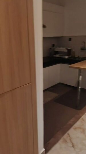 Kitchen in Studio Apartment at Nimbus The Golden Palm, Sector 168 – for Sale