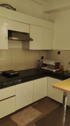 Kitchen in Studio Apartment at Nimbus The Golden Palm, Sector 168 – for Sale