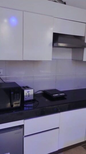 Kitchen in Studio Apartment at Nimbus The Golden Palm, Sector 168 – for Sale