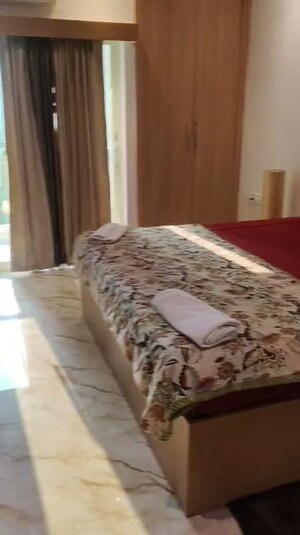 Bedroom in 1 RK Apartment at Nimbus The Golden Palm, Sector 168 – for Rent