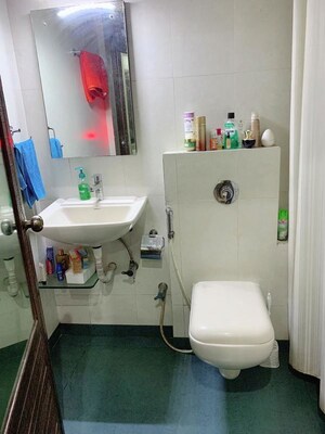 Bathroom in 1 BHK Apartment at Andheri CHS, Andheri West – for Rent