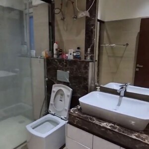 Bathroom in 3 BHK Apartment at Adani Samsara Vilasa, Sector 63 – for Rent