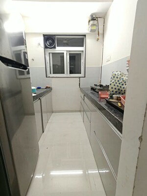 Kitchen in 1 BHK Apartment at Ashar Axis, Majiwada – for Rent