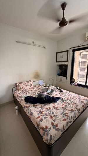 Bedroom in 2 BHK Apartment at Swapnalok Towers, Malad East – for Rent