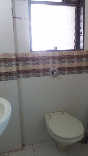 Bathroom in 2 BHK Apartment at Sawan Highness, Kharghar – for Rent