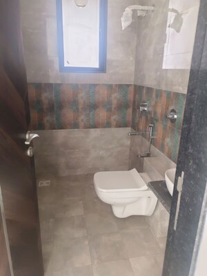 Bathroom in 3 BHK Apartment at Udyog Nagar – for Sale