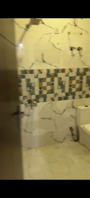 Bathroom in 3 BHK Builder Floor at Vasundhara Sector 5 – for Sale