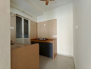 Kitchen in 2 BHK Apartment at Dosti Oak, Balkum Pada – for Rent