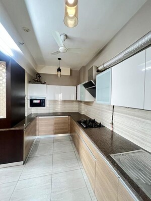 Kitchen in 3 BHK Apartment at ABA Cleo County, Sector 121 – for Rent