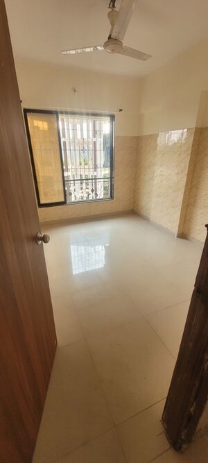 Room in 2 BHK Apartment at Mukund Ritu, Mira Road – for Rent