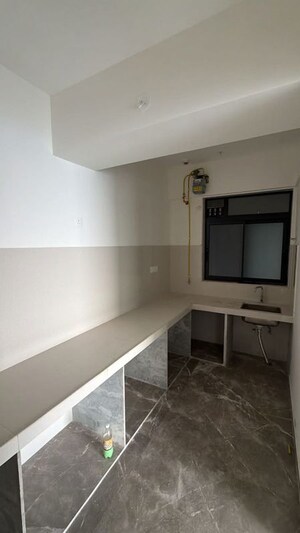 Kitchen in 2.5 BHK Apartment at Prescon Midtown Bay, Mahim West – for Sale