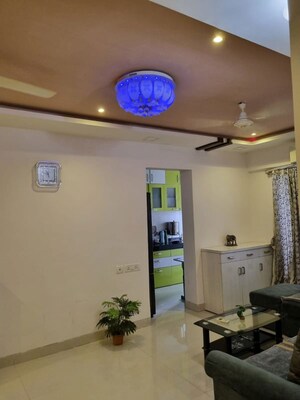 Living Room in 2 BHK Apartment at Lakshmi Omkar CHS, Azad Nagar – for Rent