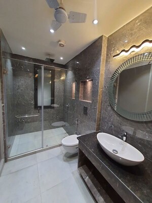 Bathroom in 4 BHK Builder Floor at Sushant Lok I – for Rent