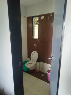 Bathroom in 1 BHK Apartment at Tejas Estate Poorva Residency, Pimple Saudagar – for Rent