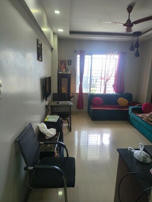 Living Room in 1 BHK Apartment at Tejas Estate Poorva Residency, Pimple Saudagar – for Rent