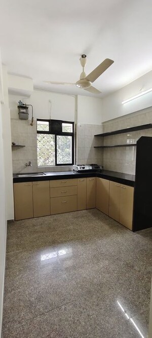 Kitchen in 2 BHK Apartment at Dosti Maitri Gardens, Pokhran Road No Two – for Rent