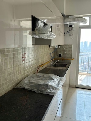 Kitchen in 3 BHK Apartment at Godrej Woods, Sector 43 – for Rent