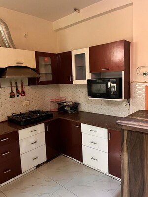 Kitchen in 4 BHK Apartment at Parsvnath Planet Plaza, Gomti Nagar – for Rent