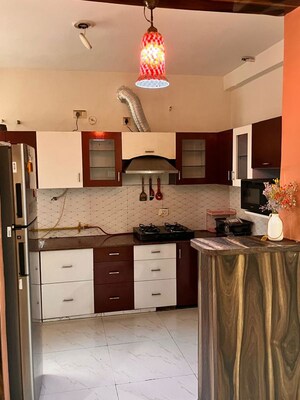 Kitchen in 4 BHK Apartment at Parsvnath Planet Plaza, Gomti Nagar – for Rent