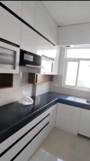 Kitchen in 2.5 BHK Apartment at Smart World Gems, Sector 89 – for Rent