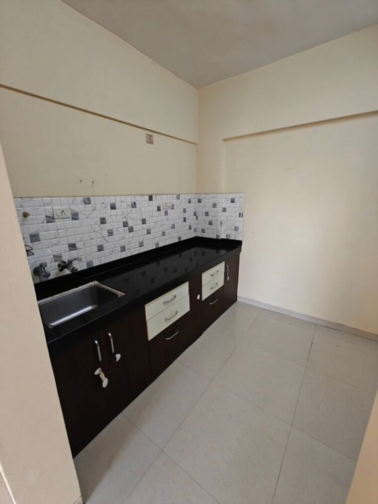 Kitchen, anushree-astral-residency 2 Bedroom 920 Sq.Ft. Apartment In Punawale Pune 10786148