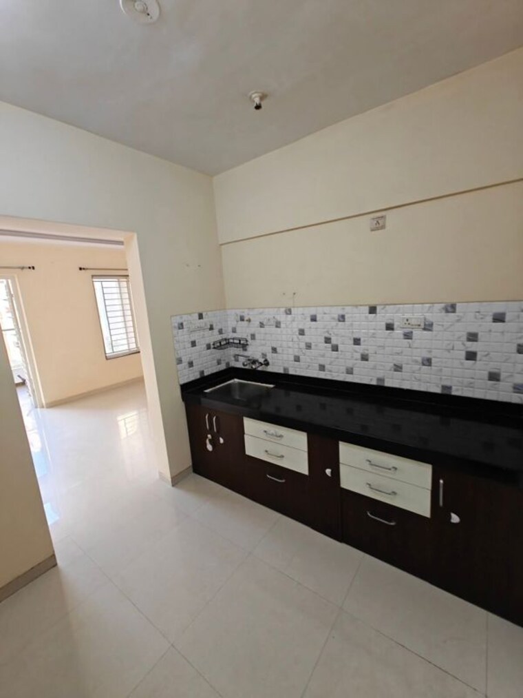 Kitchen, anushree-astral-residency 2 Bedroom 920 Sq.Ft. Apartment In Punawale Pune 10786148