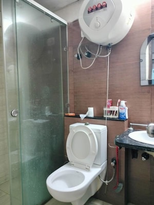 Bathroom in 3 BHK Apartment at Mahagun Moderne, Sector 78 – for Rent