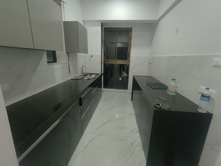 Kitchen, raymond-ten-x-habitat 2 Bedroom 635 Sq.Ft. Apartment In Pokhran Road No Two Thane 10786191