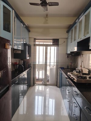 Kitchen in 3 BHK Apartment at Conwood Enclave, Vasant Vihar – for Rent