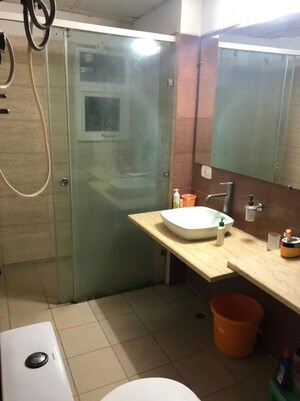 Bathroom in 3 BHK Apartment at Mahagun Moderne, Sector 78 – for Rent