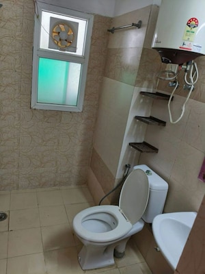 Bathroom in 3 BHK Apartment at Mahagun Moderne, Sector 78 – for Rent