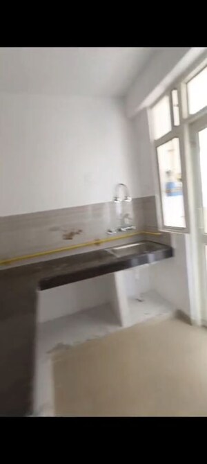 Kitchen in 2 BHK Apartment at Proview Officer City 2, Raj Nagar Extension – for Sale