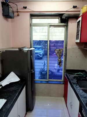 Kitchen in 3 BHK Apartment at Shanti CHS Kopar Khaiane, Kopar Khairane – for Rent