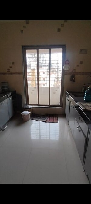 Kitchen in 2 BHK Apartment at Rashmi Harsh, Mira Road – for Rent