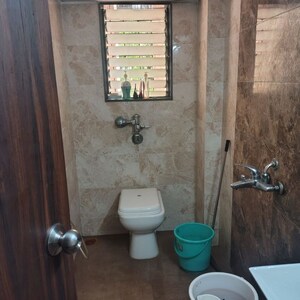 Bathroom in 2 BHK Apartment at Wellington Apartment, Andheri West – for Rent
