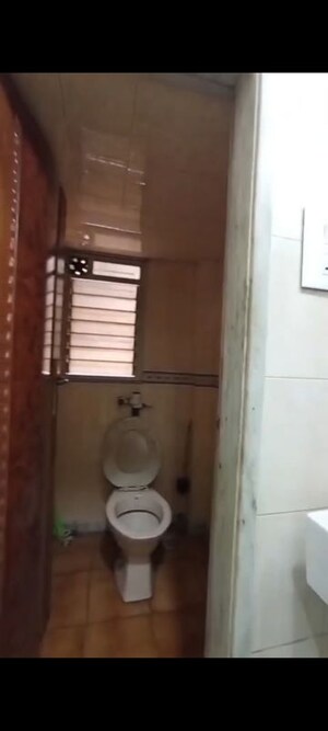 Bathroom in 1 BHK Apartment at Vireshwar Jyot CHS, Vile Parle East – for Rent
